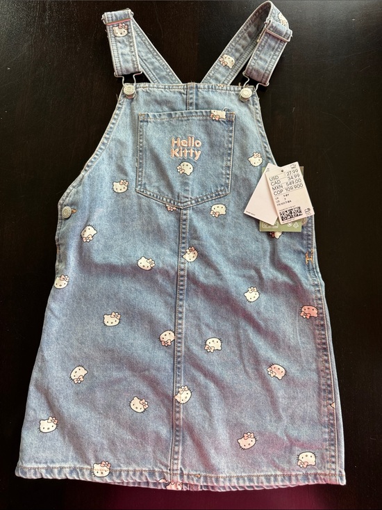 Hello Kitty Other - Hello Kitty Light Blue Denim Overall Dress with All-Over Kitty Faces